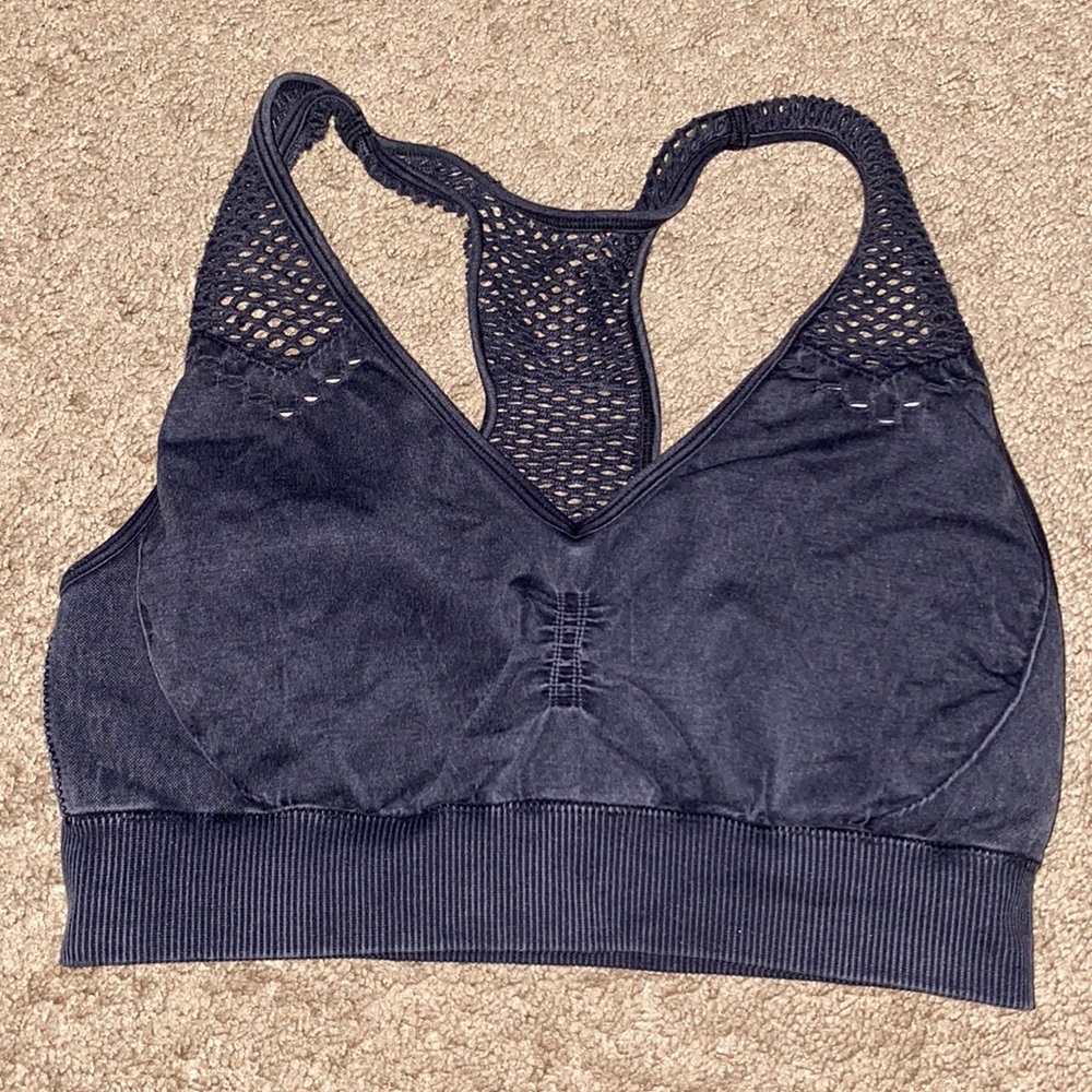Very comfortable sports bra and holes in the backing and straps